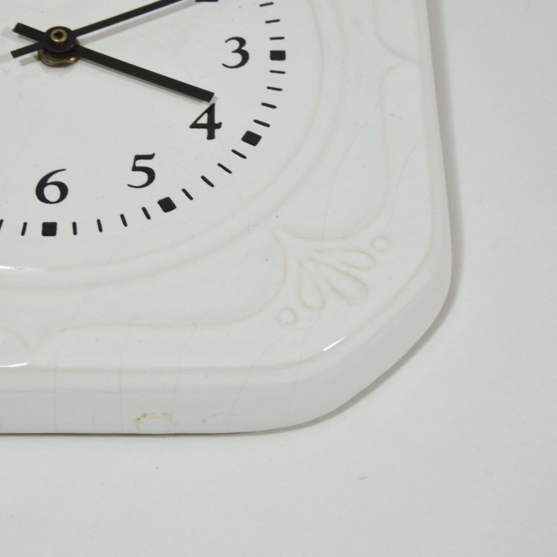 White porcelaine wall clock