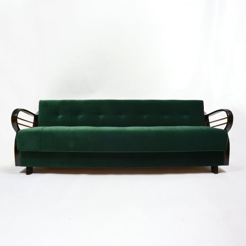 Dark green velvet sofa