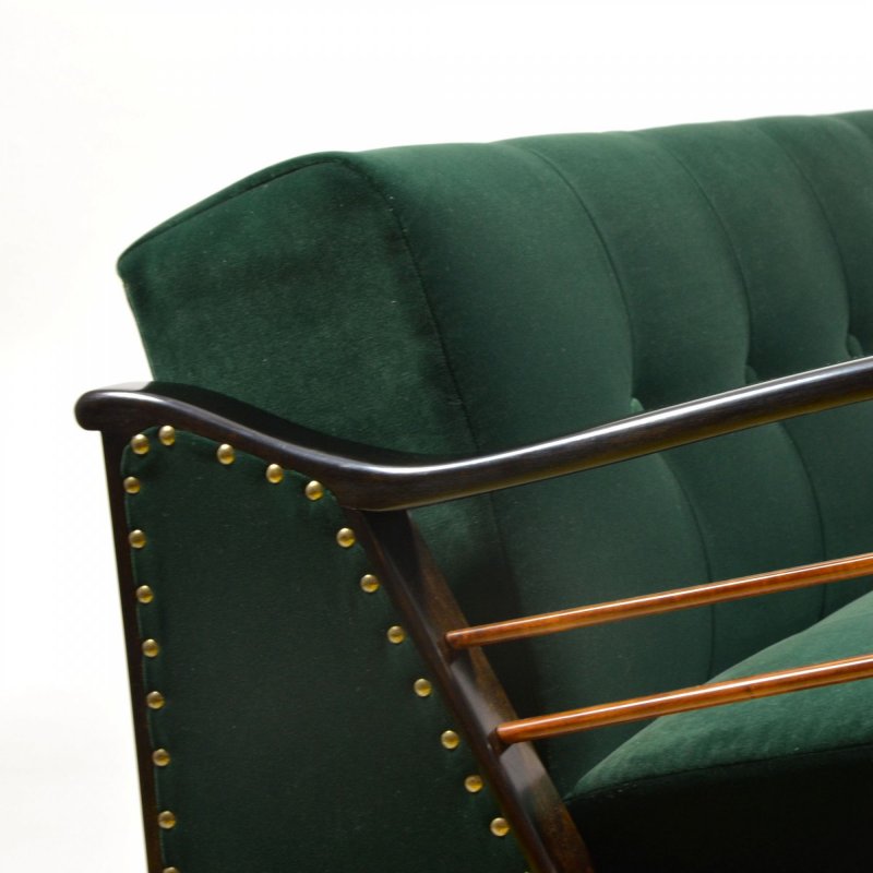 Dark green velvet sofa