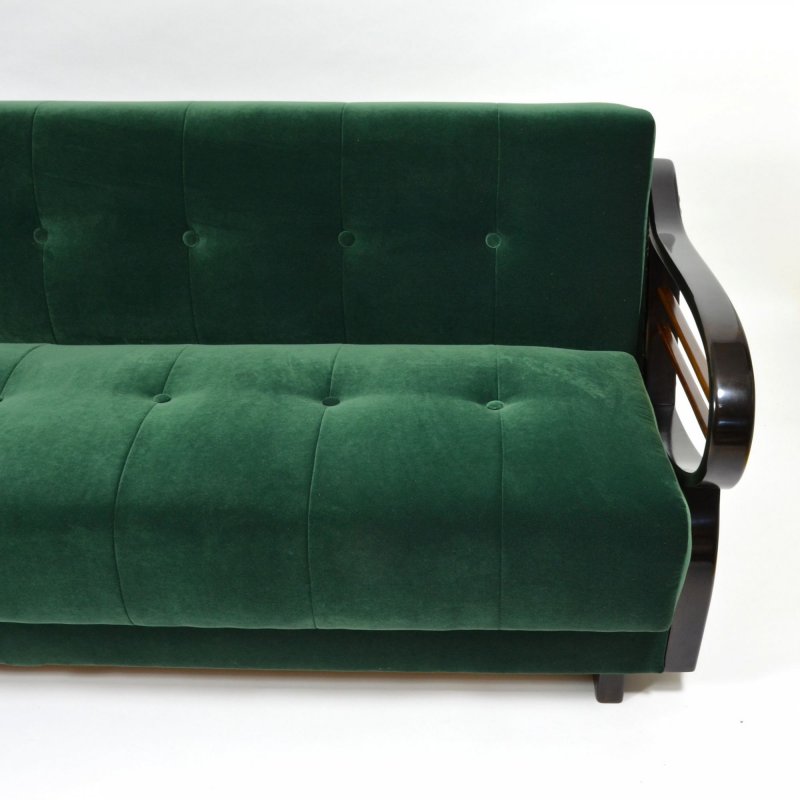 Dark green velvet sofa