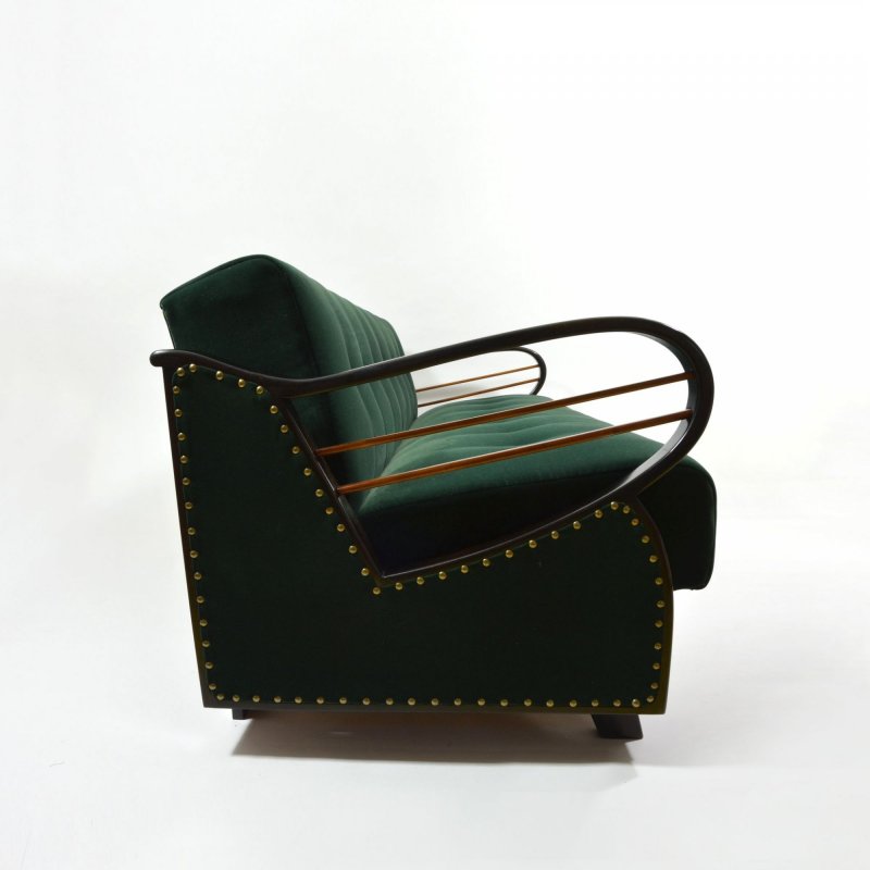 Dark green velvet sofa