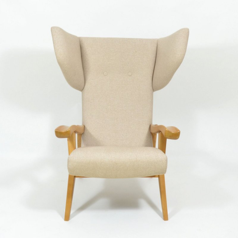 Extraordinary vintage wing armchair