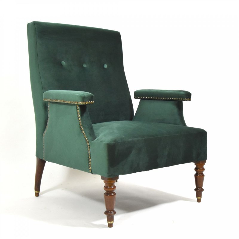 Armchair in green velvet