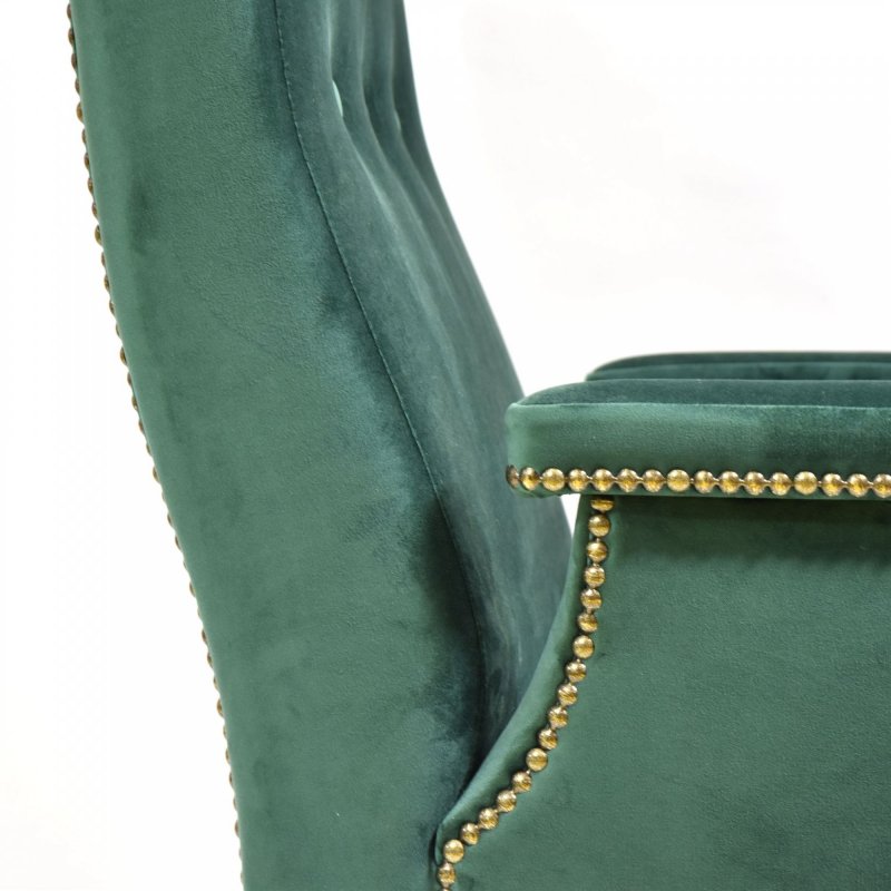 Armchair in green velvet