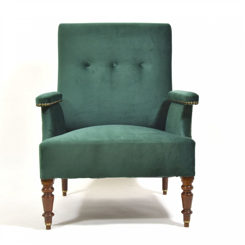 Armchair in green velvet