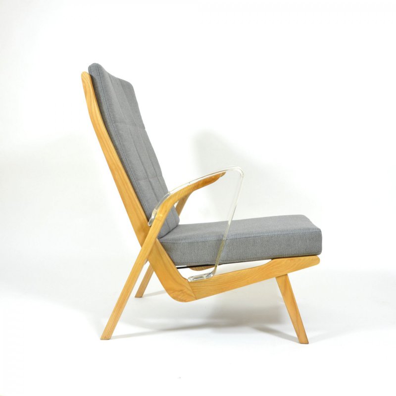 Unique retro armchair with plexiglass armrests