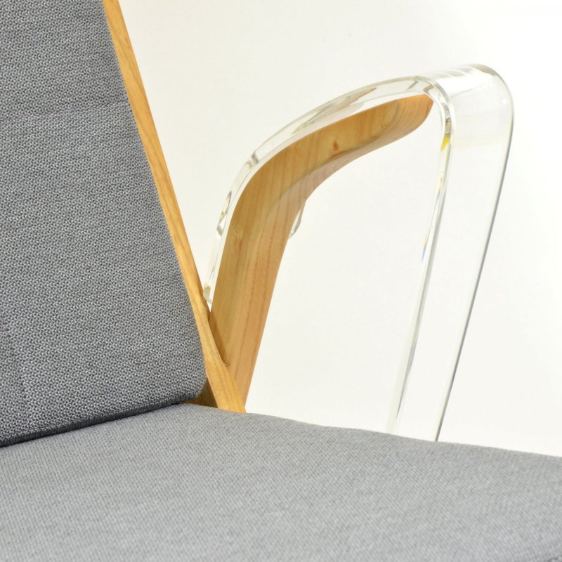 Unique retro armchair with plexiglass armrests