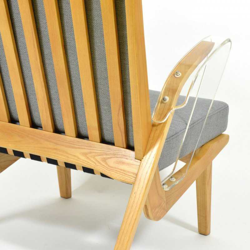 Unique retro armchair with plexiglass armrests