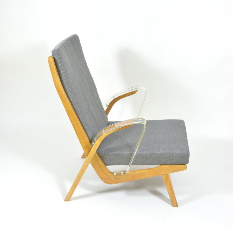 Unique retro armchair with plexiglass armrests