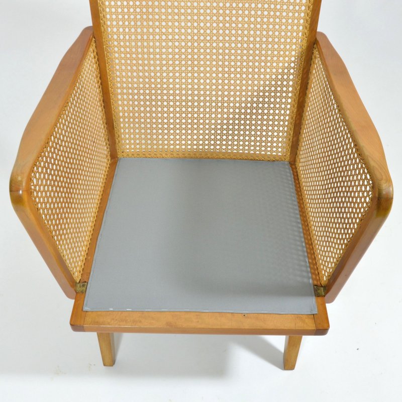 Armchair with rattan strings