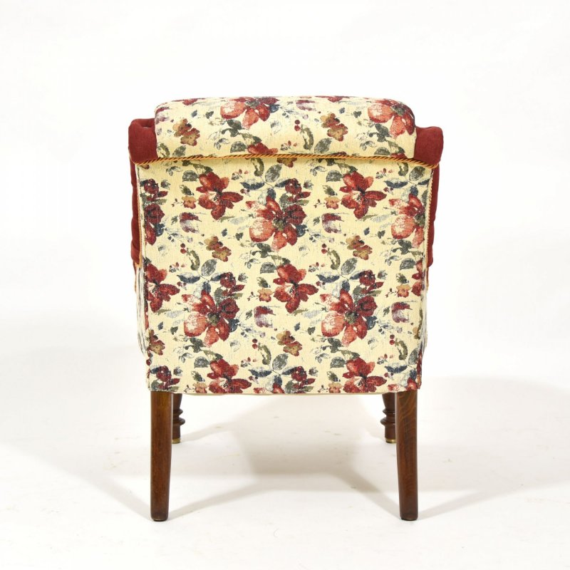 Antique flowered armchair