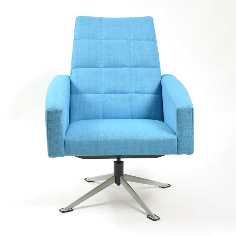 Blue swivel armchair