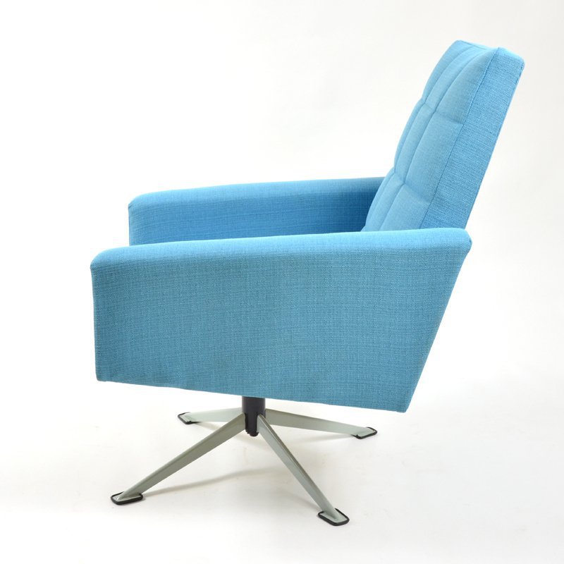 Blue swivel armchair