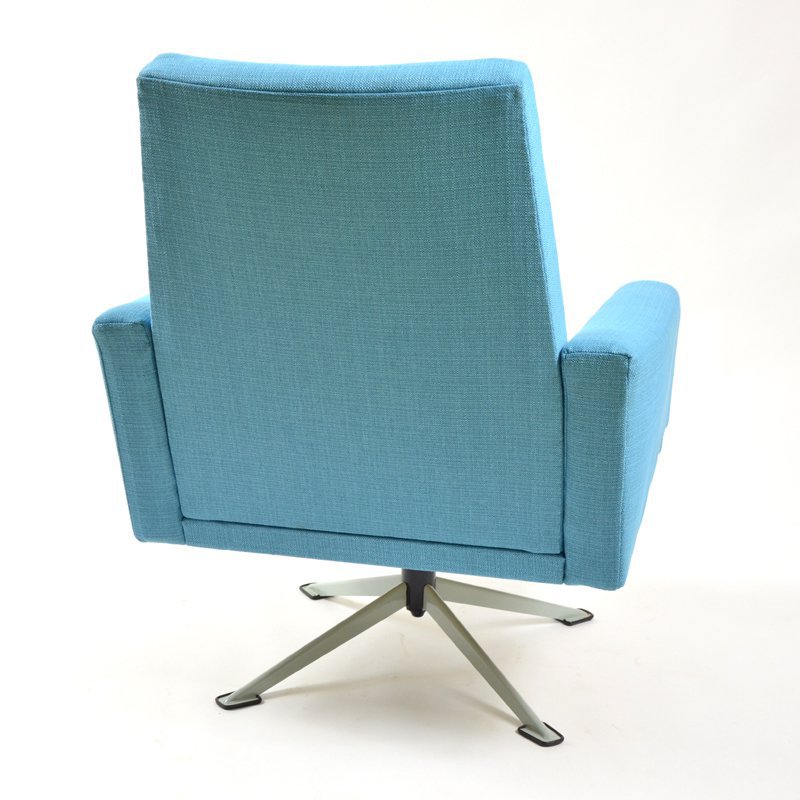 Blue swivel armchair