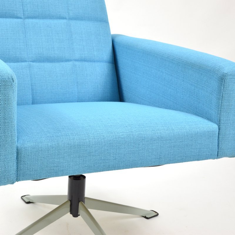 Blue swivel armchair