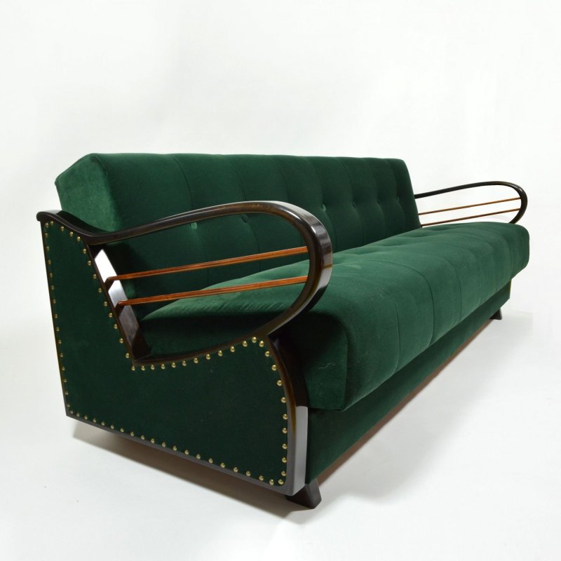 Dark green velvet sofa